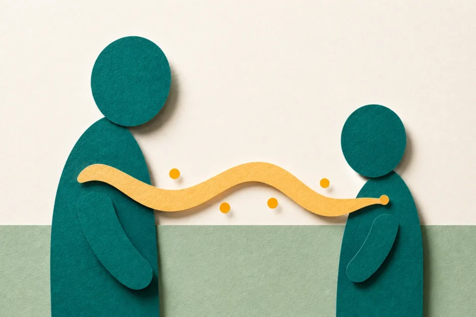 Co-regulation ADHD — paper cut illustration of a parent and child facing each other with a shared amber wave of nervous system attunement passing between them.